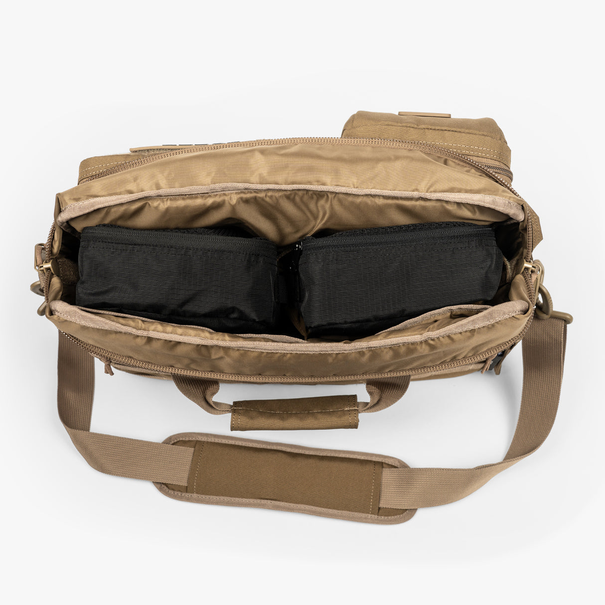 Tactical diaper bag with two packing cubes inside, showcasing organized storage for baby essentials.