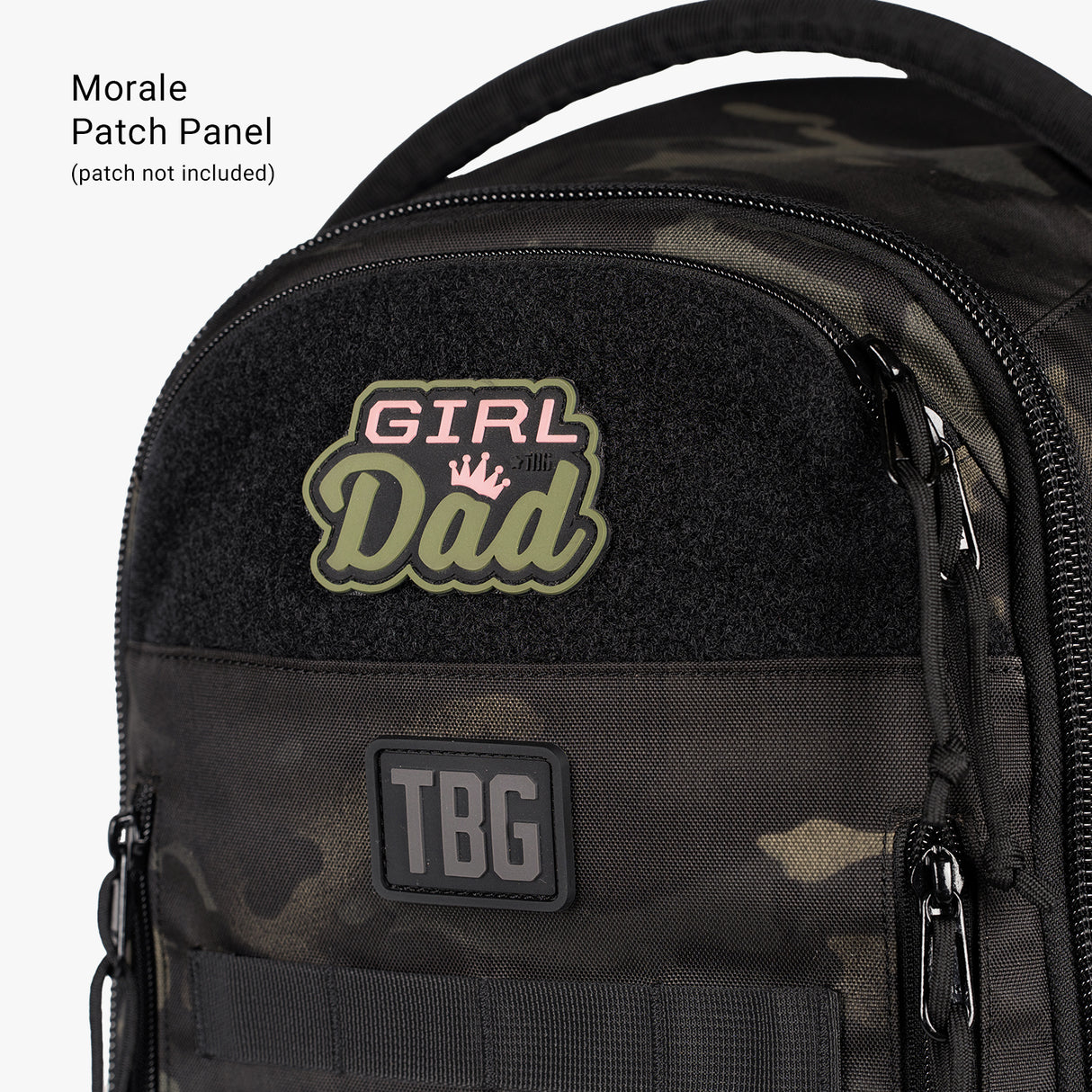Black daypack diaper bag with "Girl Dad" patch and baby carrier bundle, featuring multiple compartments and durable design.