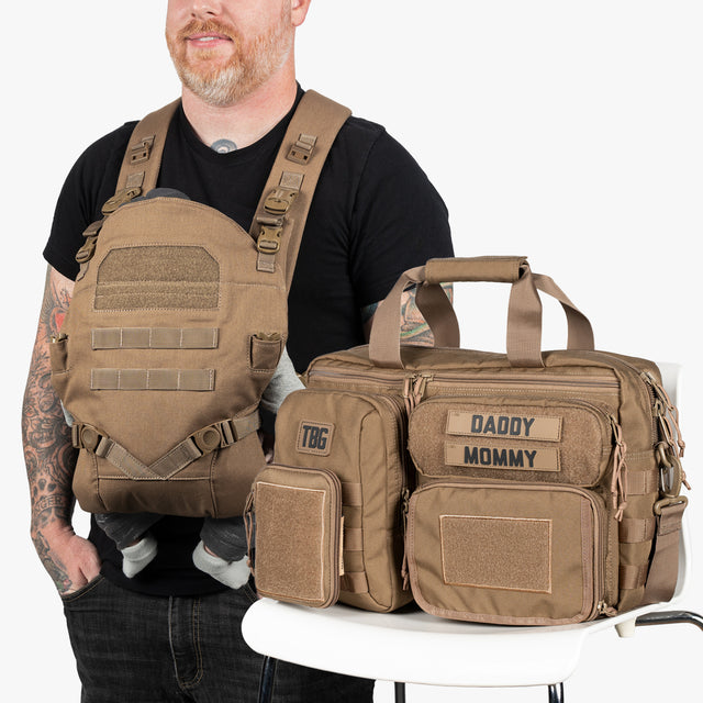 Tactical Baby Gear Deuce Diaper Bag and Baby Carrier bundle in tan, featuring multiple storage compartments and adjustable straps.