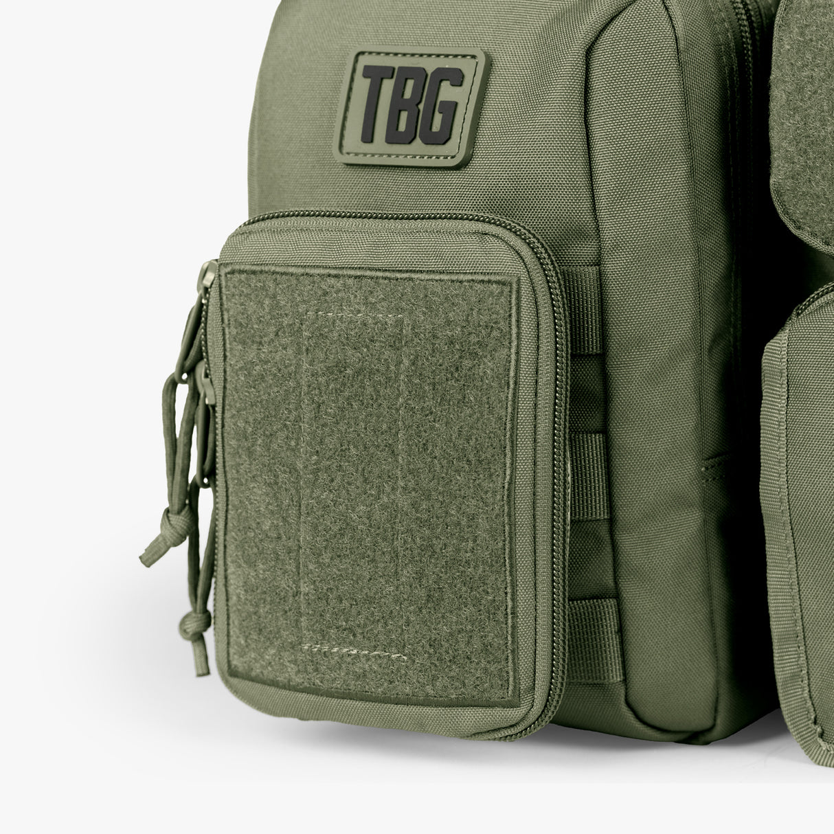 Olive green tactical diaper bag and baby carrier bundle with multiple compartments, adjustable straps, and durable fabric.