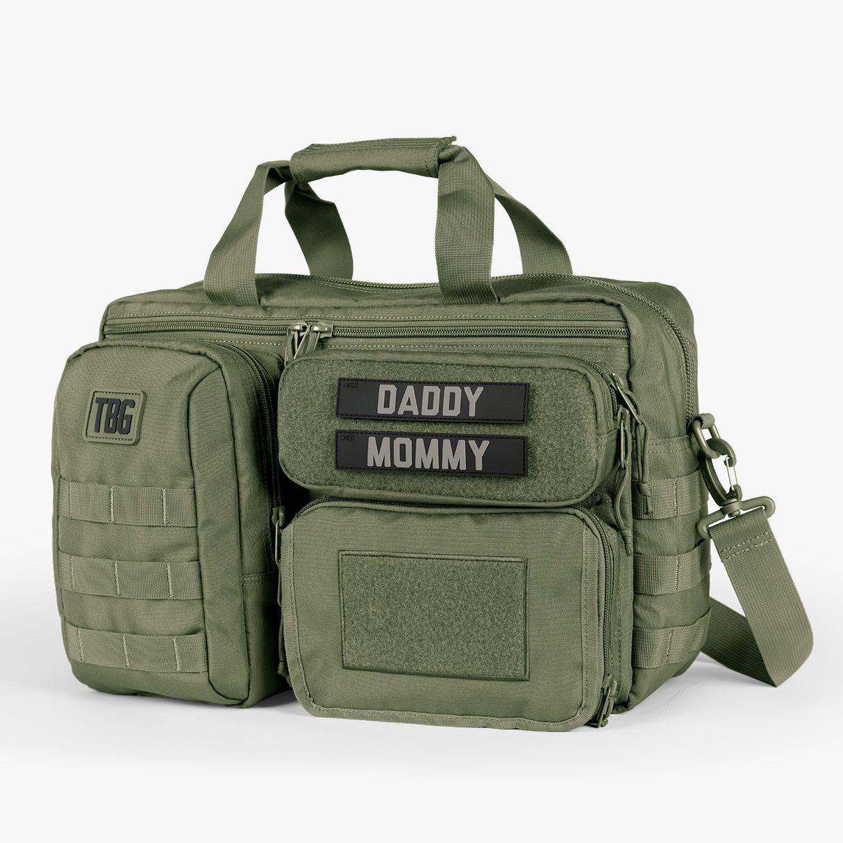Olive green tactical diaper bag with multiple compartments, Velcro patches labeled Daddy and Mommy, and adjustable shoulder strap.