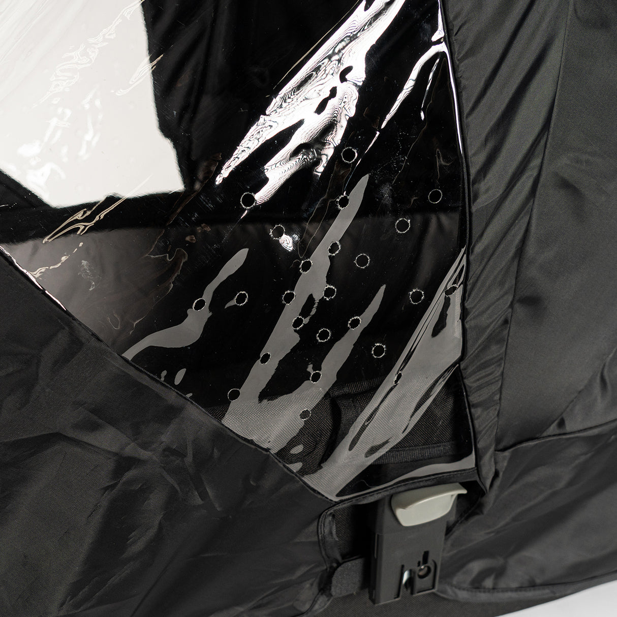 S-1 Bassinet rain cover featuring a clear window and ventilation holes for protection against rain and moisture.