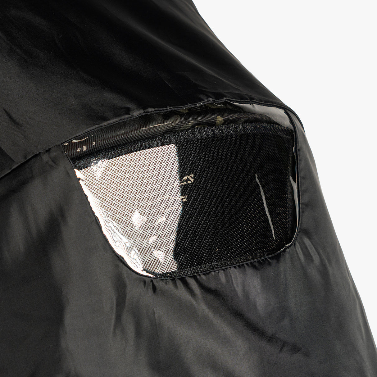 Rain cover for S-1® Bassinet featuring a clear mesh window for visibility and ventilation, designed for rugged outdoor use.