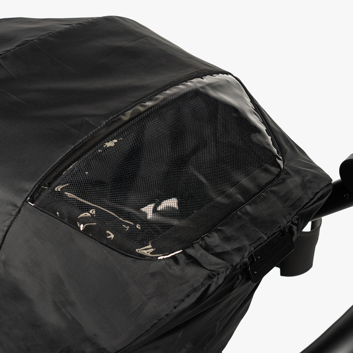 Black S-1 Rain Cover with a mesh window, designed to protect strollers from rain while maintaining visibility.