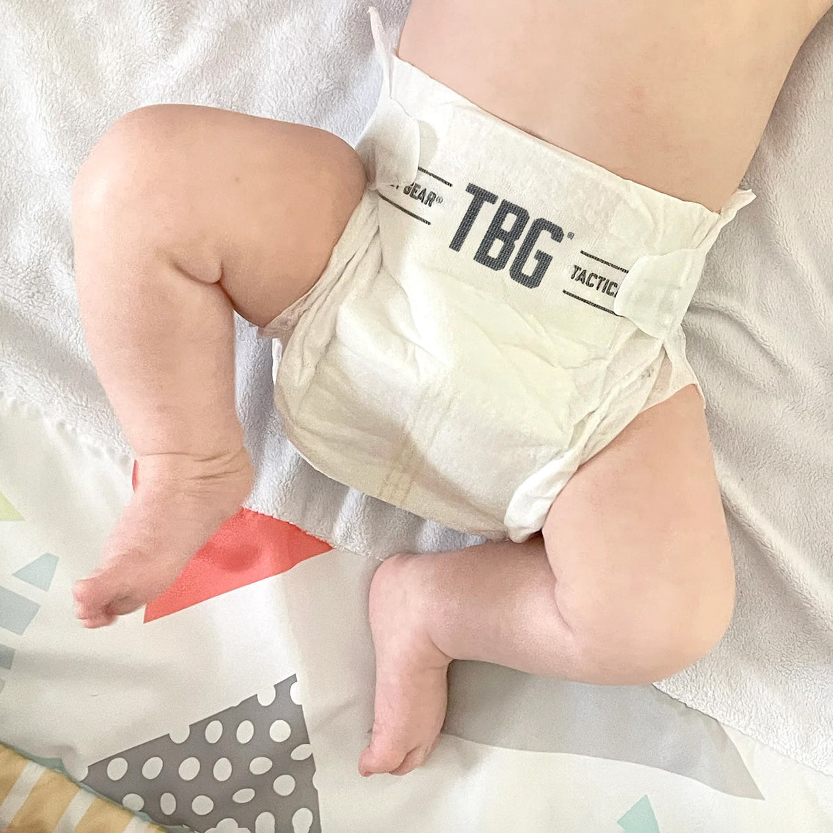 Premium Tactical Baby Gear diapers on a baby, showcasing comfort and durability for modern parenting.