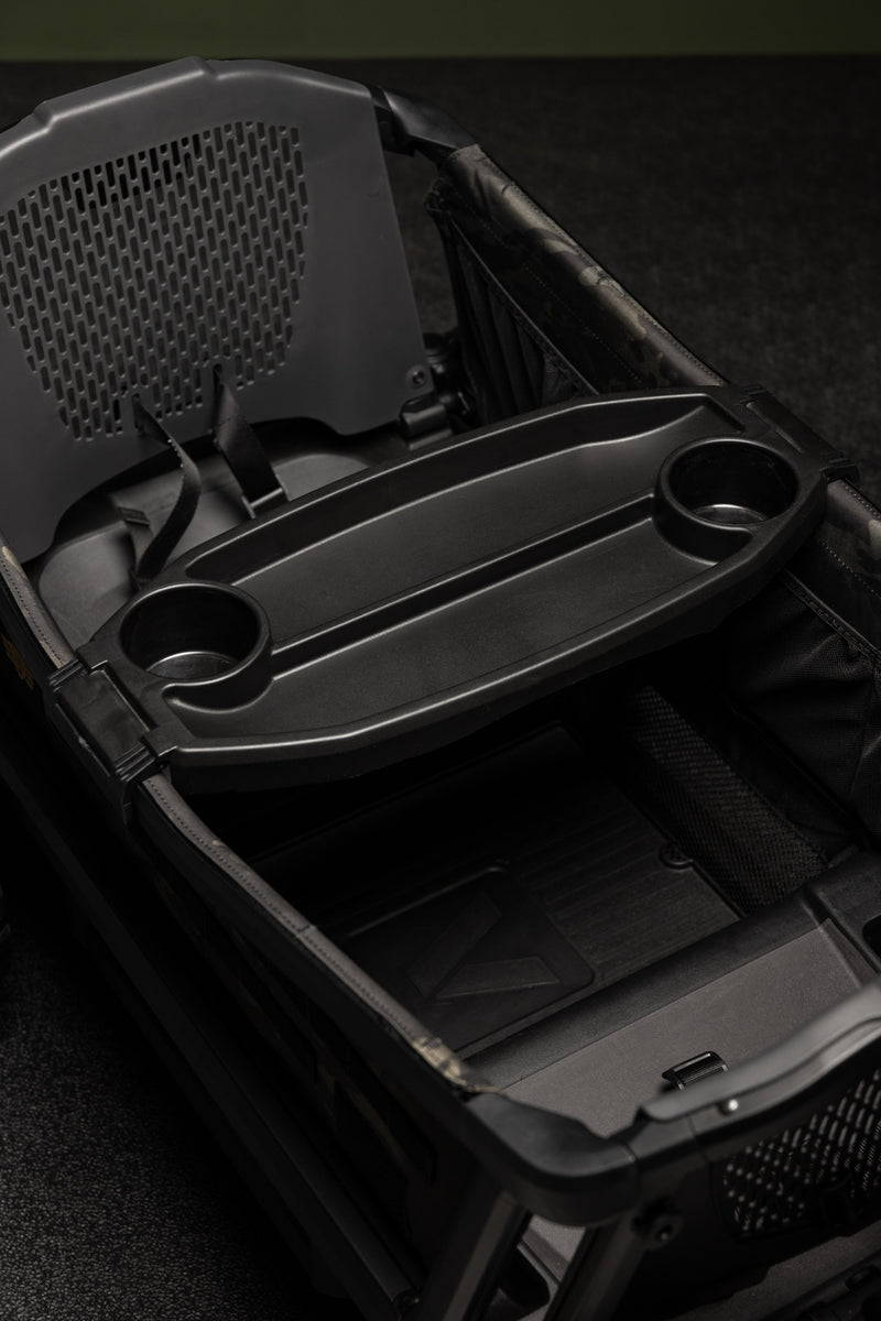 Black tactical baby stroller with durable design and multiple compartments.