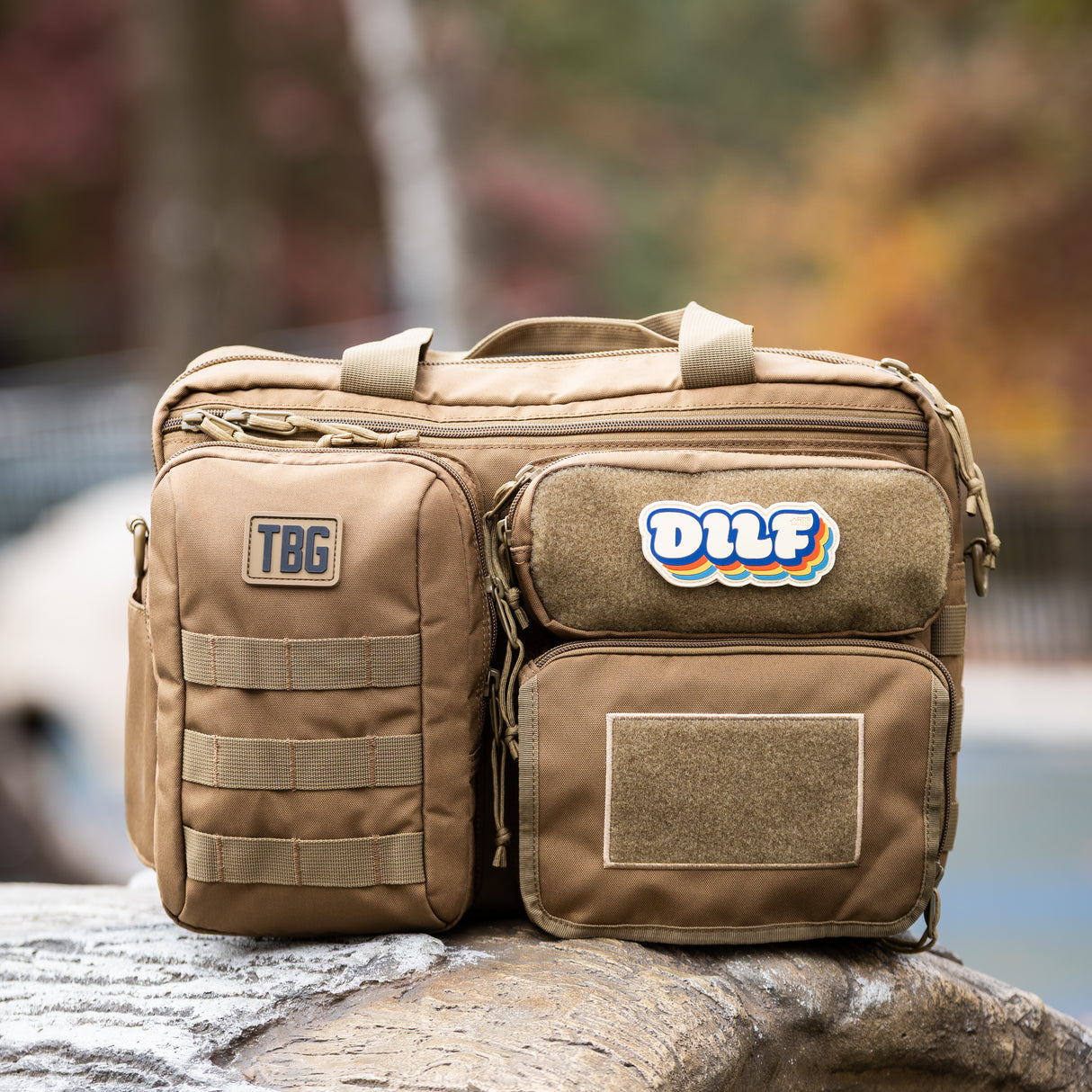 Tactical Baby Gear DILF patch on a rugged diaper bag, showcasing military-inspired design and functionality.
