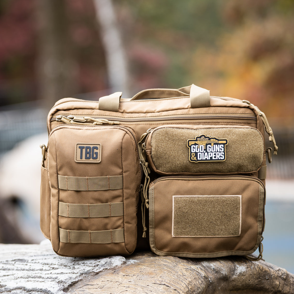 Tactical Baby Gear God, Guns & Diapers Patch on a rugged diaper bag, showcasing military-inspired design and functionality.