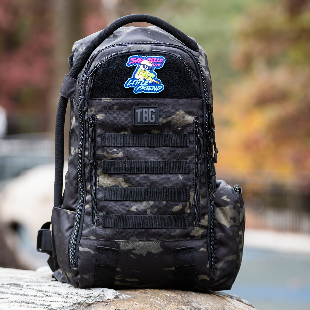 Tactical Baby Gear Little Friend Patch on a rugged black camo backpack, showcasing military-inspired design and functionality.