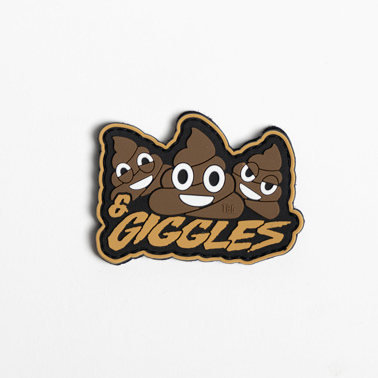 Embroidered patch reading "Shits & Giggles" in stylized white font on a black background, with decorative stars and a smiley face.