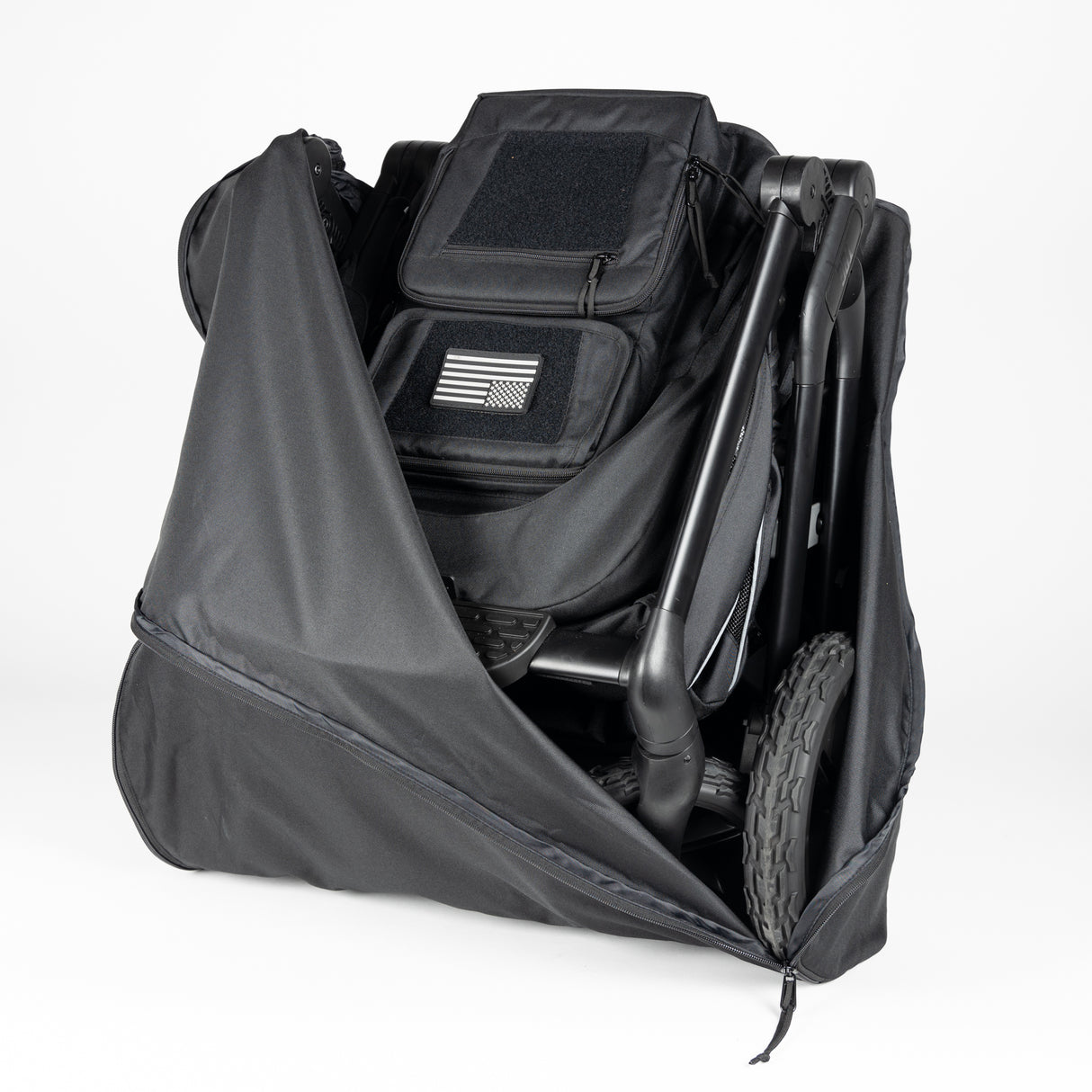 Black S-1™ Stroller Travel Bag with brand logo, padded handles, and adjustable shoulder strap, displayed on a plain background.