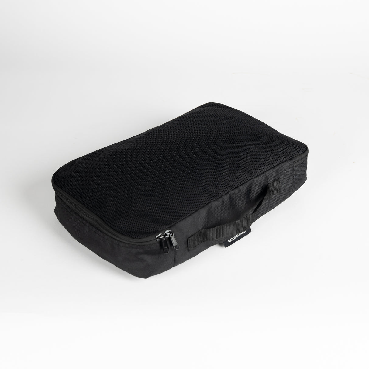 Black stroller travel bag with adjustable shoulder strap and zip closure, displayed against a white background.