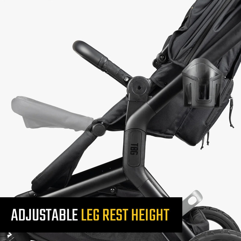 Close-up of a black, military-style stroller with adjustable leg rest and robust frame.