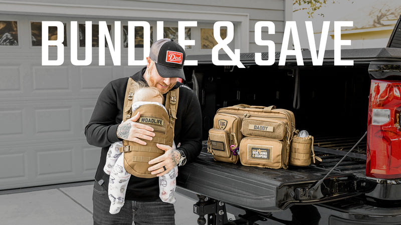 Man with baby in carrier, standing by truck with military-style diaper bags, promoting a bundle offer.