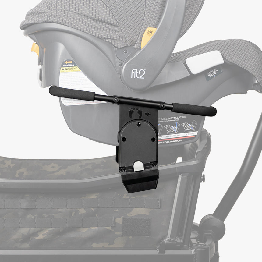 Cruiser XL stroller adapter connected to a Chicco car seat, displayed on a white background.