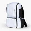 White expedition diaper bag displayed against a plain background, featuring multiple pockets and adjustable straps.