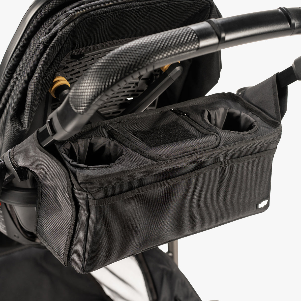 A compact, portable snack pack with various compartments filled with nuts, fruits, and seeds.