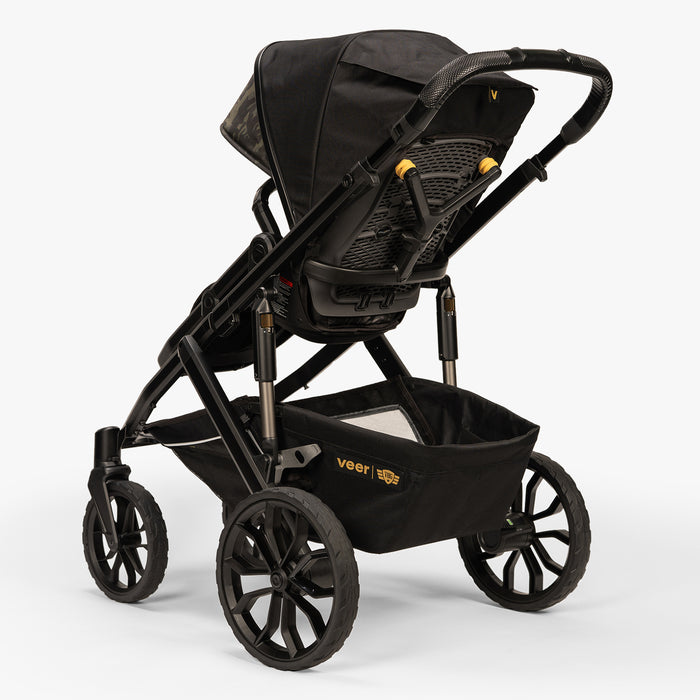 Black Veer Switchback 2-seat stroller in a three-quarter rear-left view on a white background.