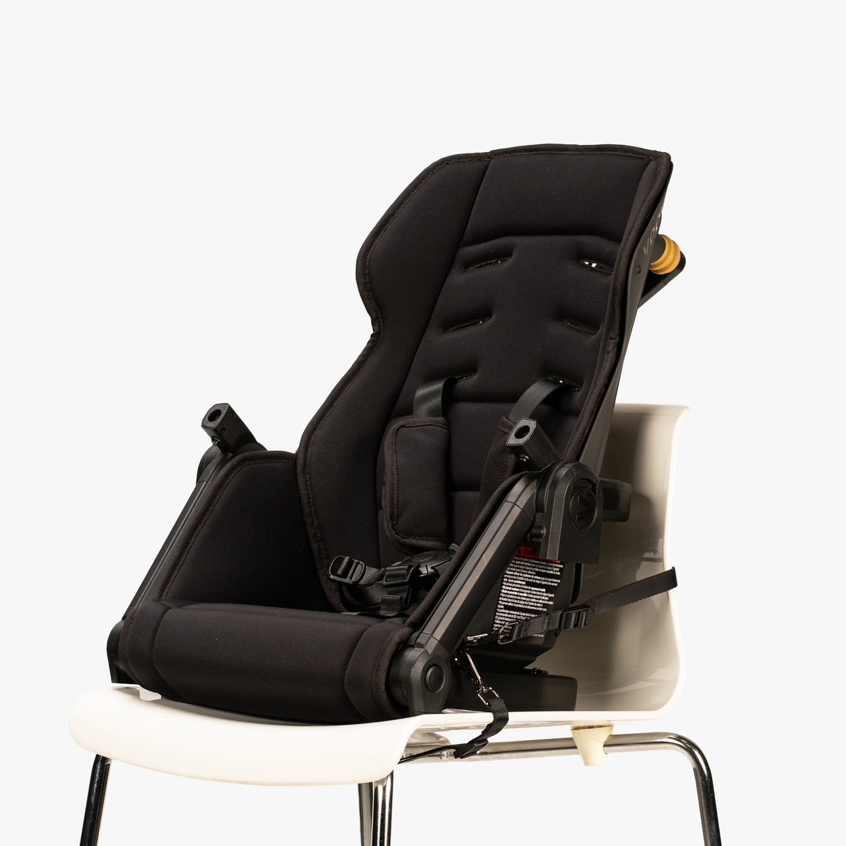 Baby carrier and portable seat combo from TBG, featuring adjustable straps and foldable design, displayed against a plain background.