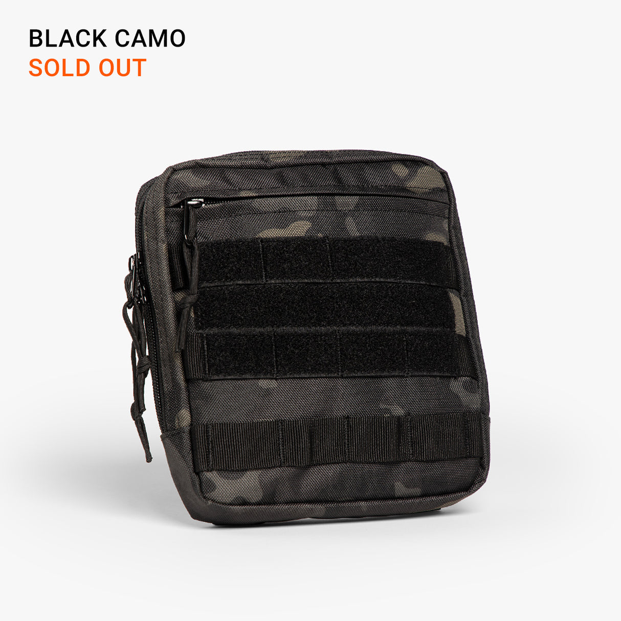 Black camouflage tactical diaper bag with multiple zippered compartments and MOLLE webbing for rugged parenting gear.