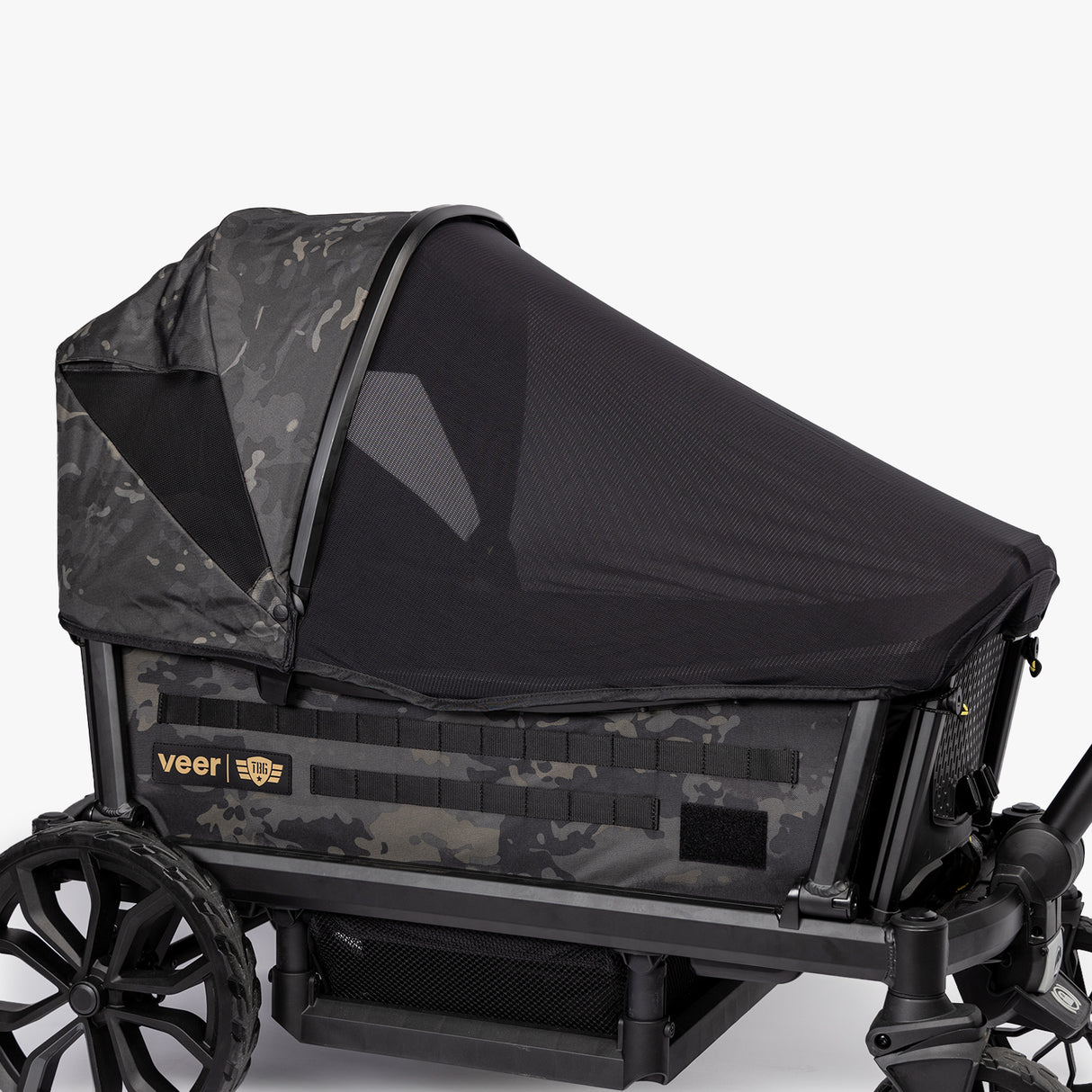 Rugged Cruiser Newborn Bundle featuring a camouflage stroller with a protective canopy and spacious storage.