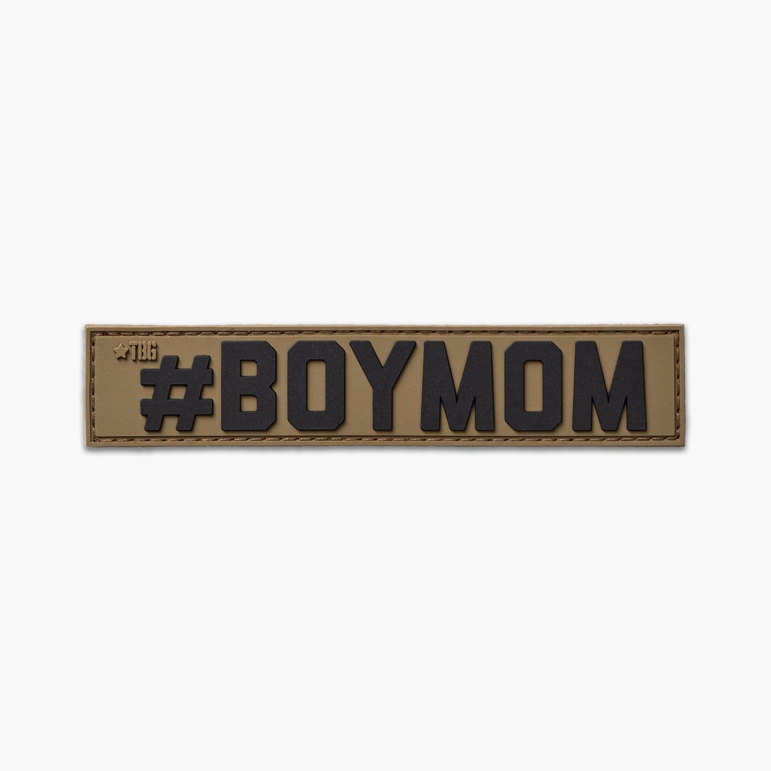 Brown nametape with black lettering reading #BOYMOM