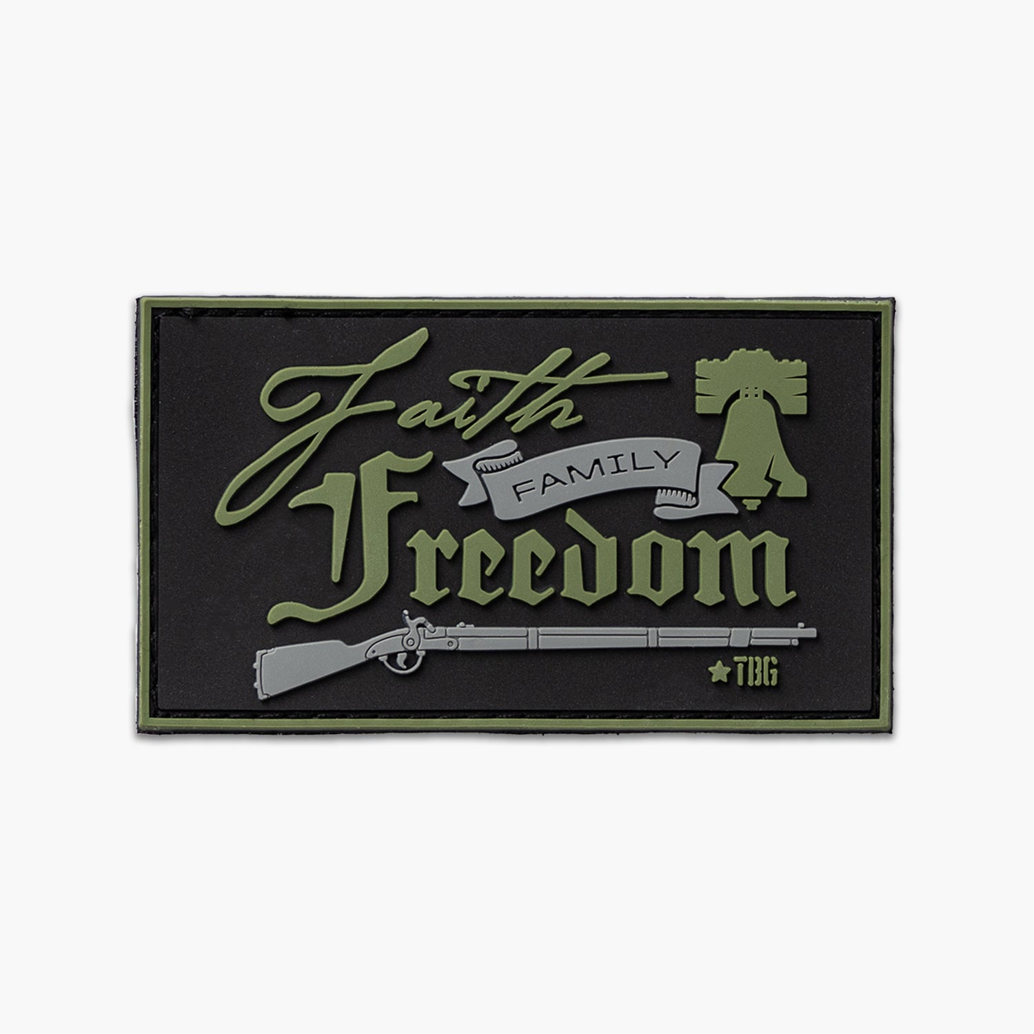 Black patch with gray and green text reading Faith, Family, Freedom, over gray colonial era rifle. 