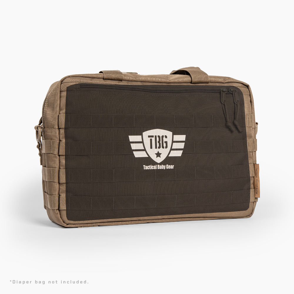 Horizontal bulletproof panel shown against diaper bag for size comparison. Horizontal bulletproof panel shown against diaper bag for size comparison.