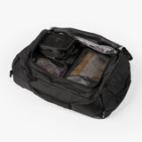Tactical Packing Cubes Bundle inside a black duffel bag, featuring organized compartments for efficient storage.