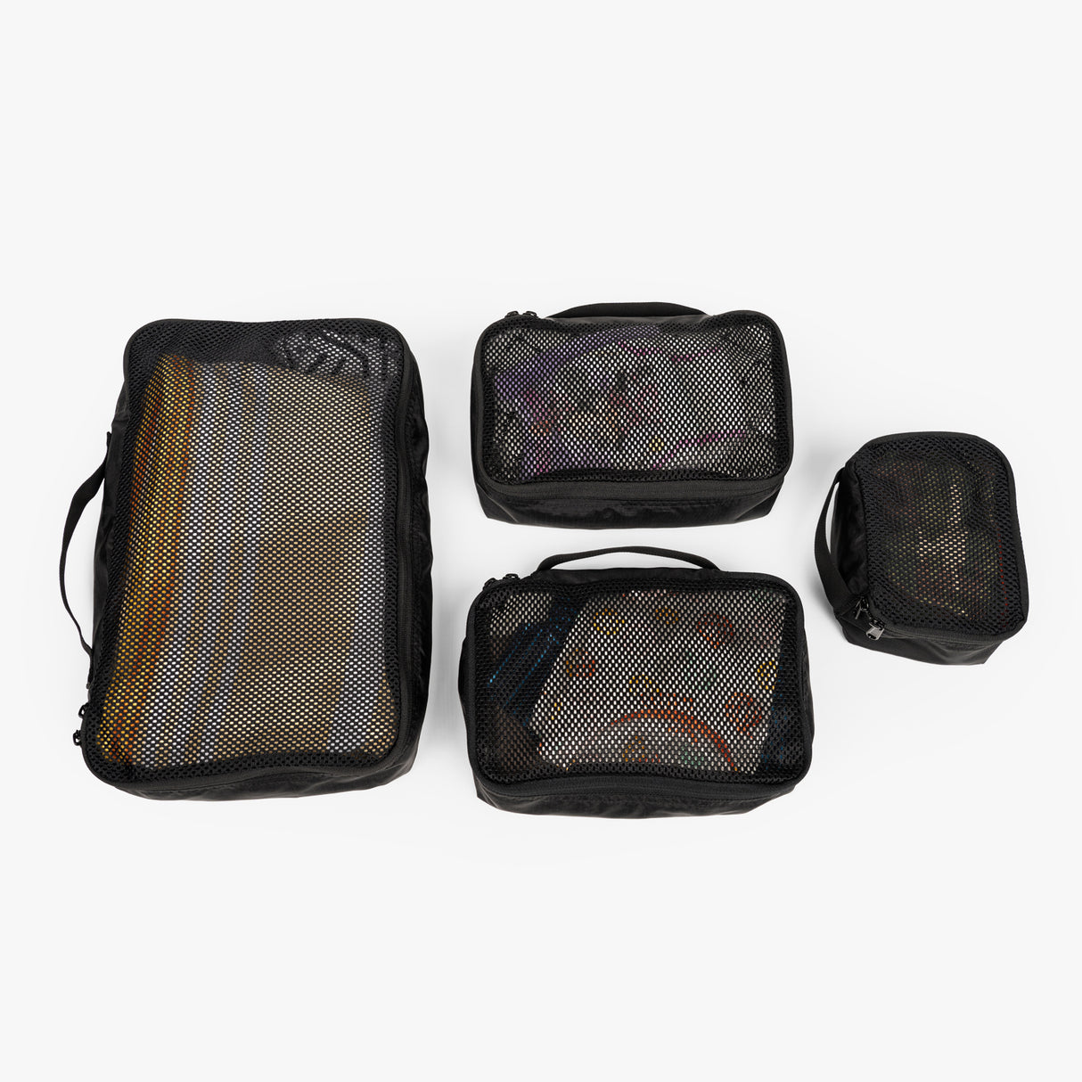 Tactical Packing Cubes Bundle featuring four durable, mesh-zippered organizers for efficient travel and storage.