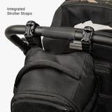 Compact black Daypack Mini with integrated stroller straps, designed for easy attachment to strollers.