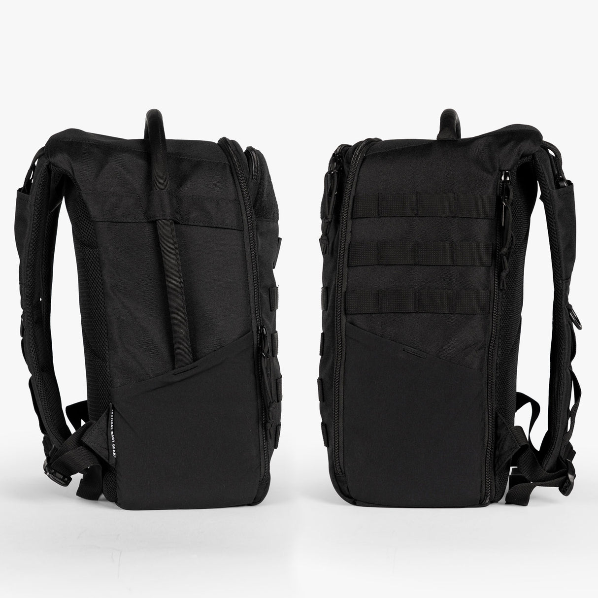 Compact black mini diaper bag backpack with multiple pockets and a sleek design, ideal for on-the-go parents.