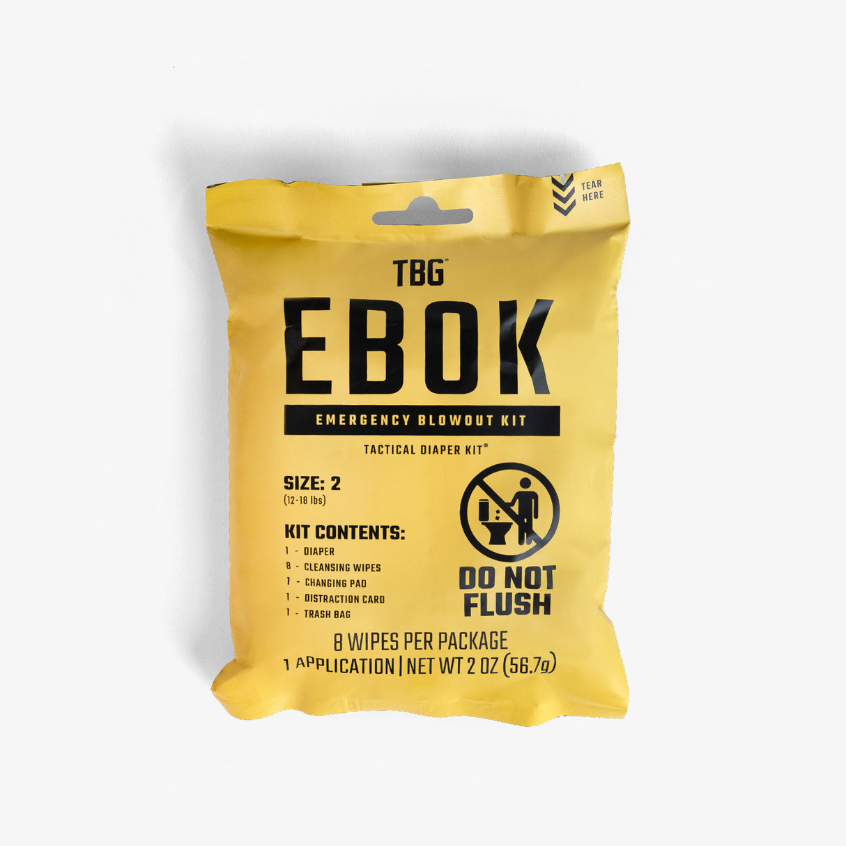 Tactical Baby Gear EBOK diaper changing kit in yellow packaging, includes wipes, distraction card, and trash bag.