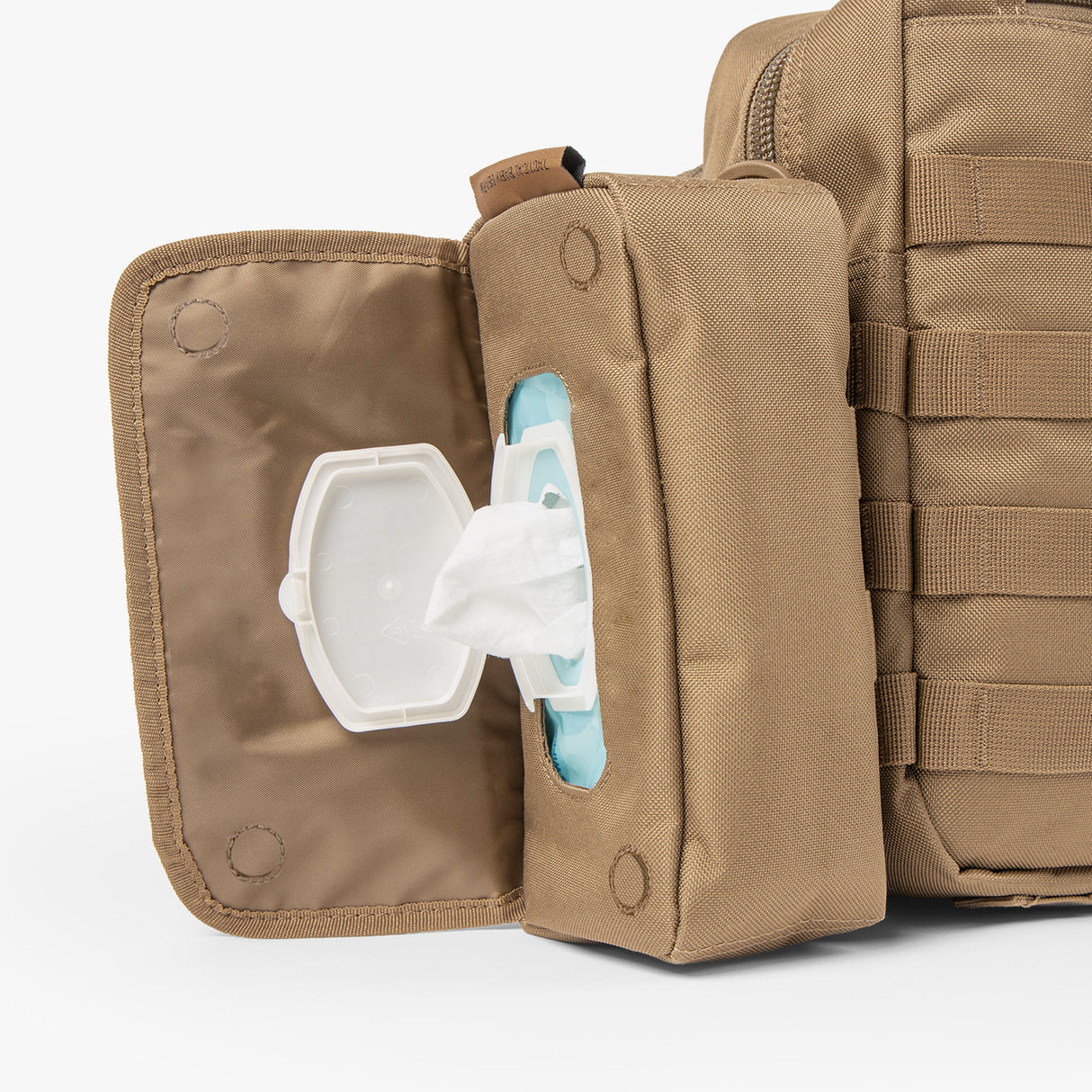 Tactical Wipe Pouch® in tan, featuring an open compartment for easy access to wet wipes. Durable and practical design.
