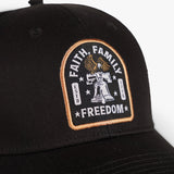 Low profile black hat featuring an embroidered patch with "Faith, Family, Freedom" and a bell design.