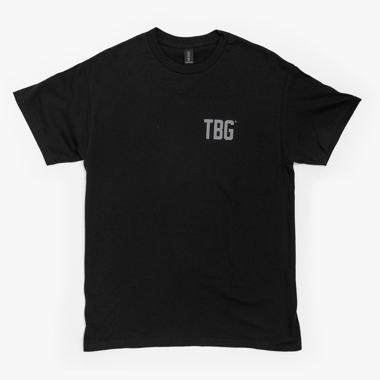 Black t-shirt featuring a subtle gray "TBG" logo on the front, designed for modern parents.