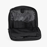 Open Tactical Utility Pouch featuring multiple compartments and elastic straps for organized storage of gear and essentials.