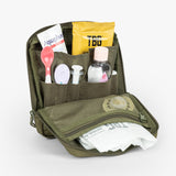 Tactical Utility Pouch with organized compartments holding baby care items and toiletries in a durable design.