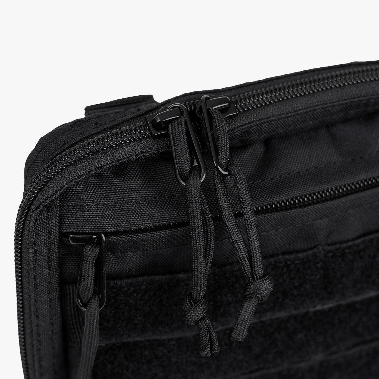 Durable black tactical utility pouch featuring dual zippers and a rugged design for versatile storage and organization.
