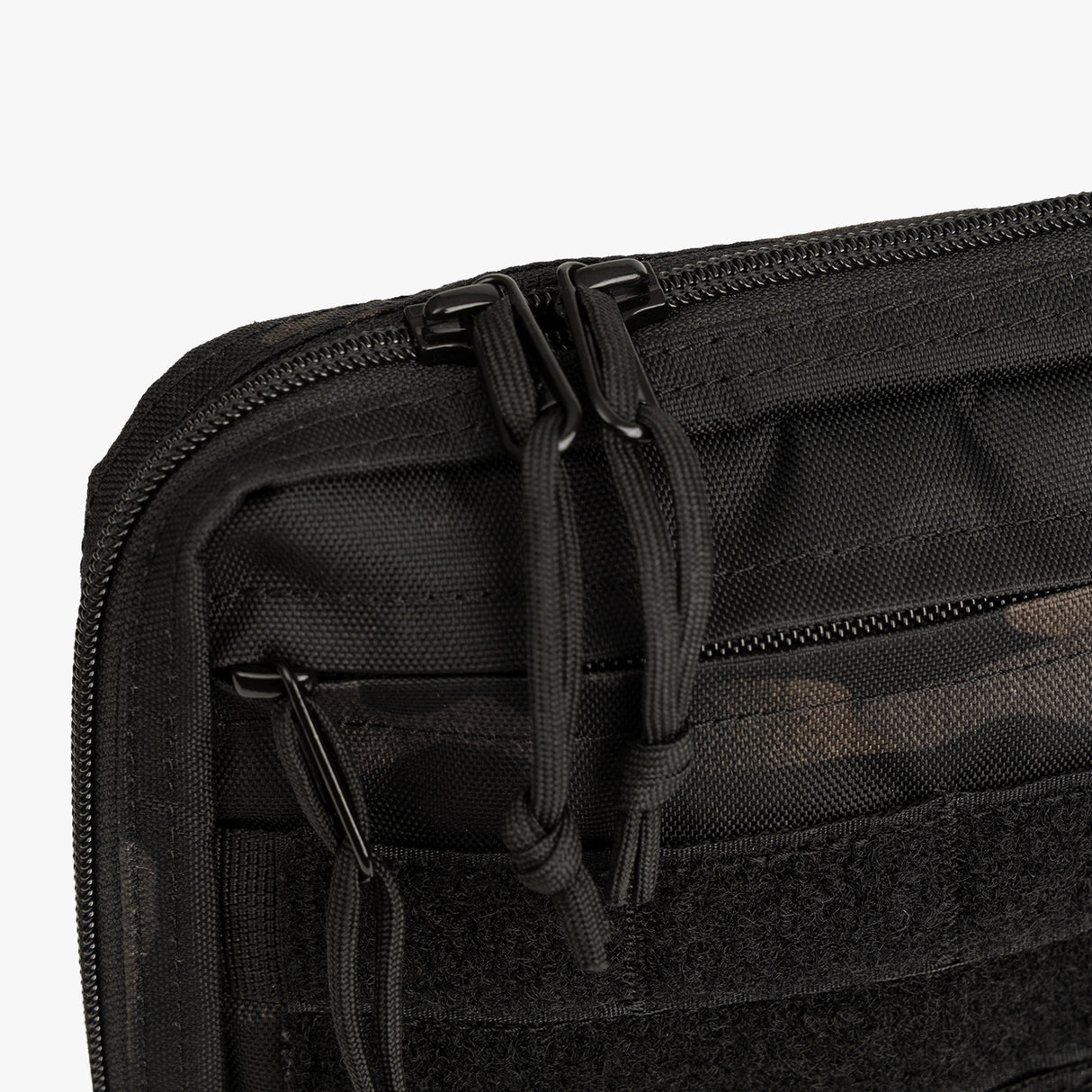 Durable Tactical Utility Pouch featuring a zippered closure and MOLLE webbing for versatile storage options.