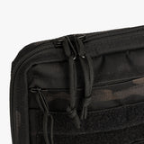 Durable Tactical Utility Pouch featuring a zippered closure and MOLLE webbing for versatile storage options.