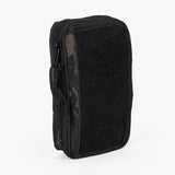 Rugged Tactical Wipe Pouch® featuring a durable exterior and secure zip closure for on-the-go parenting needs.