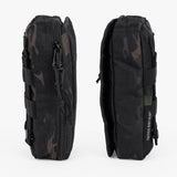 Rugged Tactical Wipe Pouch® in black camo, featuring durable zippers and straps for easy attachment and access.