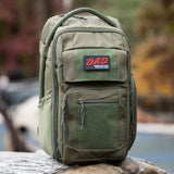 Tactical Baby Gear D.A.D. Dare Patch backpack in olive green with multiple pockets and a patch area for customization.