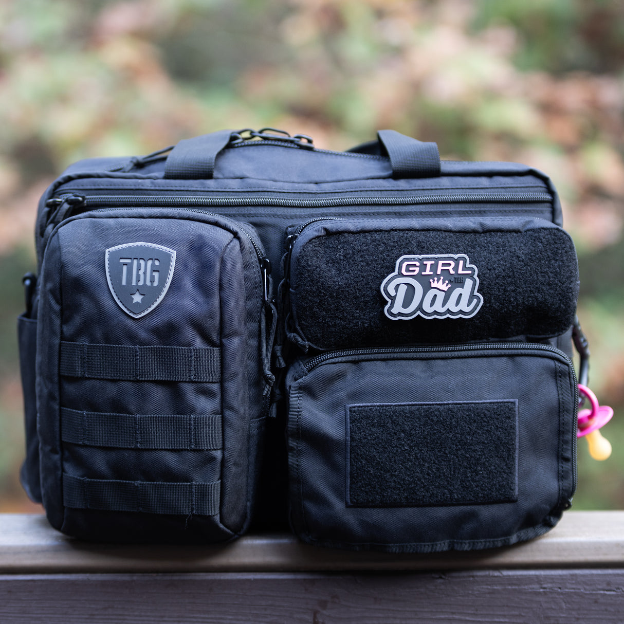 Tactical Baby Gear bag featuring a "Girl Dad" patch, designed for rugged parenting and outdoor adventures.