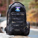 Tactical Baby Gear Little Friend Patch on a rugged black camo backpack, showcasing military-inspired design and functionality.