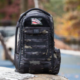 Tactical Baby Gear Mommy Shark Patch on a rugged camo backpack, designed for stylish and functional parenting.