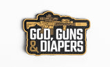 Black and gold patch featuring a detailed rifle illustration above bold white text reading “God, Guns & Diapers” on a white background.