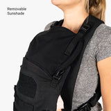 Mini diaper bag and baby carrier bundle featuring a removable sunshade, designed for convenience and style.