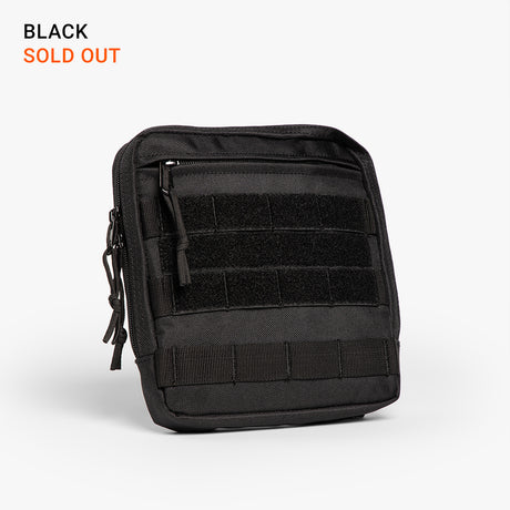 Black rugged military-style diaper bag with multiple compartments, Velcro straps, and durable fabric, now sold out.